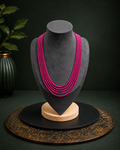 Fuchsia multi-strand beaded necklace front view