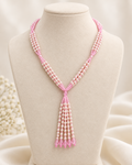 Pink and ivory multi-strand beaded tassel necklace – front bust view