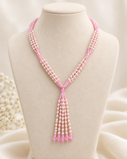 Pink and ivory multi-strand beaded tassel necklace – front bust view